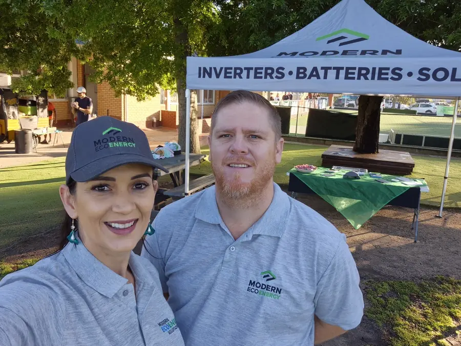 Deon and Vera in Modern Eco Energy shirts at the company's expo stand
