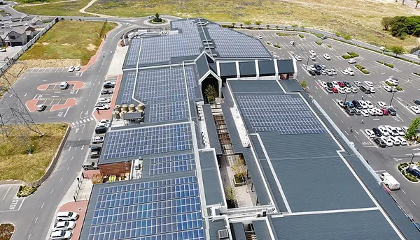 A regional mall rooftop covered in panels